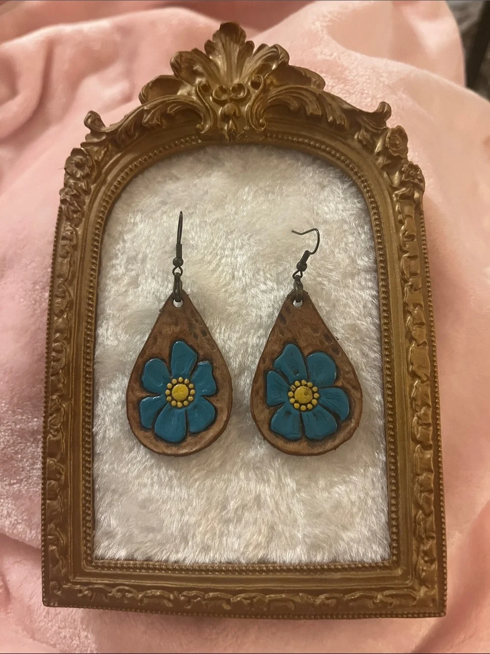 Handcrafted Teardrop Leather Earrings with Blue Flower Accent